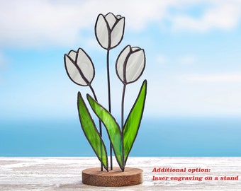 Stained glass White tulips on the wooden stand Stained glass  suncatcher Flower decoration.