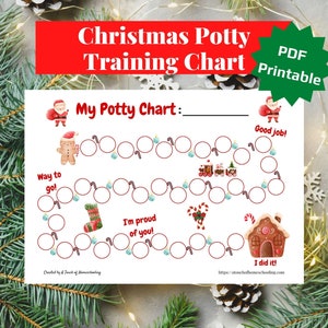 Peut inclure: Un tableau d'apprentissage de la propreté sur le thème de Noël avec un bonhomme en pain d'épices, le Père Noël et une maison en pain d'épices. Le tableau comporte un chemin de cercles à colorier au fur et à mesure que l'enfant utilise les toilettes. Le texte sur le tableau dit "Mon tableau de propreté", "Bien joué !", "Bravo !", "Je suis fier de toi !", et "J'ai réussi !"