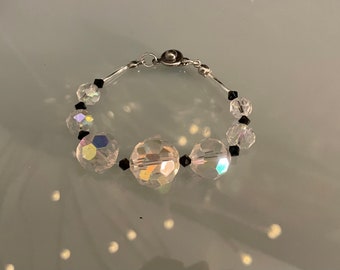 Crystal AB faceted glass bead bracelet and small pure black faceted crystal beads, very sparkling and iridescent.