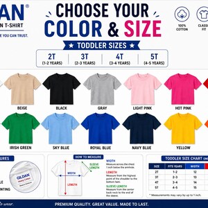 May include: A Gildan 5000 heavy cotton toddler t-shirt color and size chart. It displays fourteen shirt colors including white, beige, black, gray, pink, red, purple, green, blue, navy, yellow, and orange, with a size guide in inches.