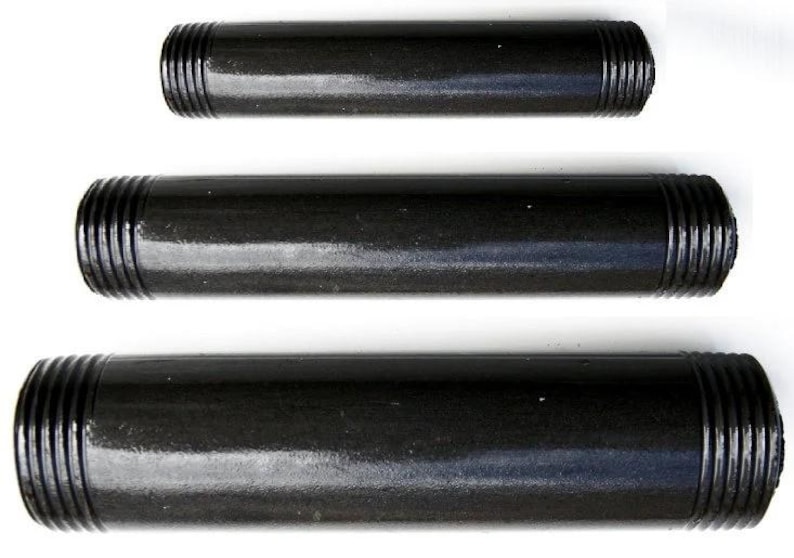 May include: Three black iron pipe fittings of different lengths. The fittings have a threaded end and a smooth, black finish.