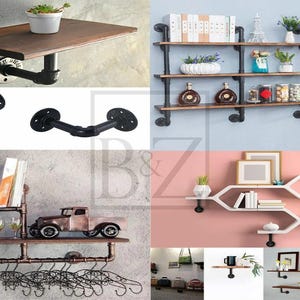 May include: A set of black metal pipe shelves with various wood shelves. The shelves are decorated with plants, books, and other decorative items. The shelves are mounted on a wall.