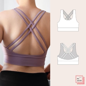 Könnte beinhalten: Ein lavendelfarbener Sport-BH mit gekreuzten Trägern auf dem Rücken. Der BH hat ein breites Band unter der Brust und ein stützendes Design. Eine Diagramm des BHs ist rechts abgebildet, zusammen mit dem Text "DO IT MY WEAR".
