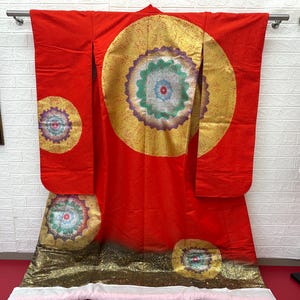 The design is based on the sun..Japanese Kimonos: Wear a Piece of Japanese Culture.Authentic Japanese Kimonos for Sale. UCHIKAKE.