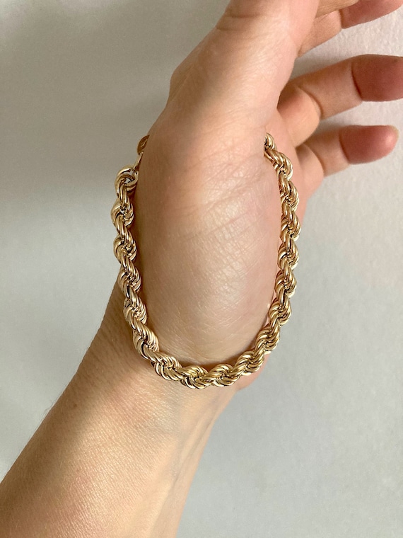 Heavy looking gold bracelet, hallmarked 9ct gold b