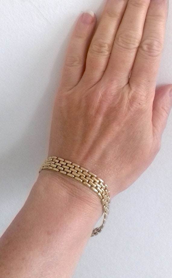 18k gold vintage panther link bracelet, 5 row pant