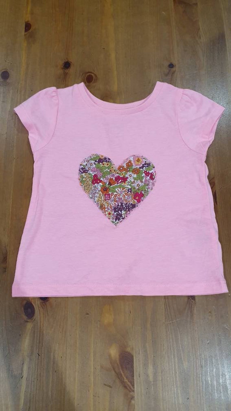 Appliqued pink heart T shirt