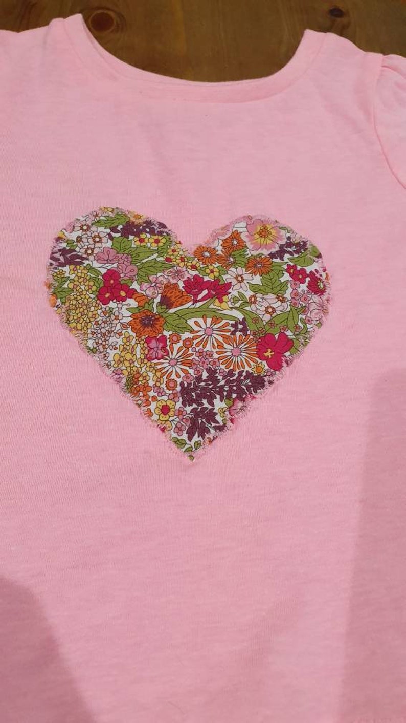 Appliqued pink heart T shirt