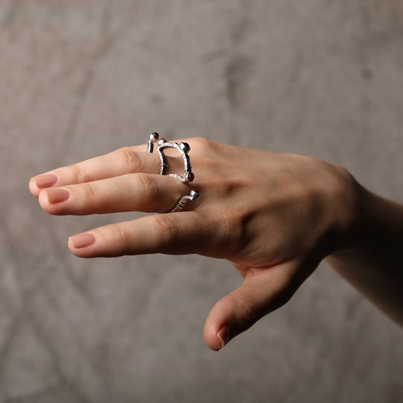 Bague multi doigts sales