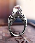 Magical crystal ball ring, witch ball ring, fortune tell hands holding ball ring, witchy ring product logo