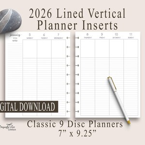 May include: A 2026 vertical planner insert with lined pages, designed for Classic 9 Disc Planners. The insert measures 17.78 cm x 23.5 cm. The text "DIGITAL DOWNLOAD" is displayed. A pen and a decorative stone are also visible.