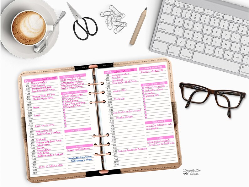 May include: A planner with a tan leather cover is open to a daily schedule, with pink highlighted sections. A cup of coffee, scissors, paper clips, a pencil, a keyboard, and glasses are arranged around the planner. The planner is labeled "Designedly Love Canada."