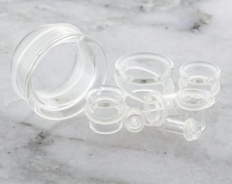 Par de túneles de vidrio transparente de una sola llamarada