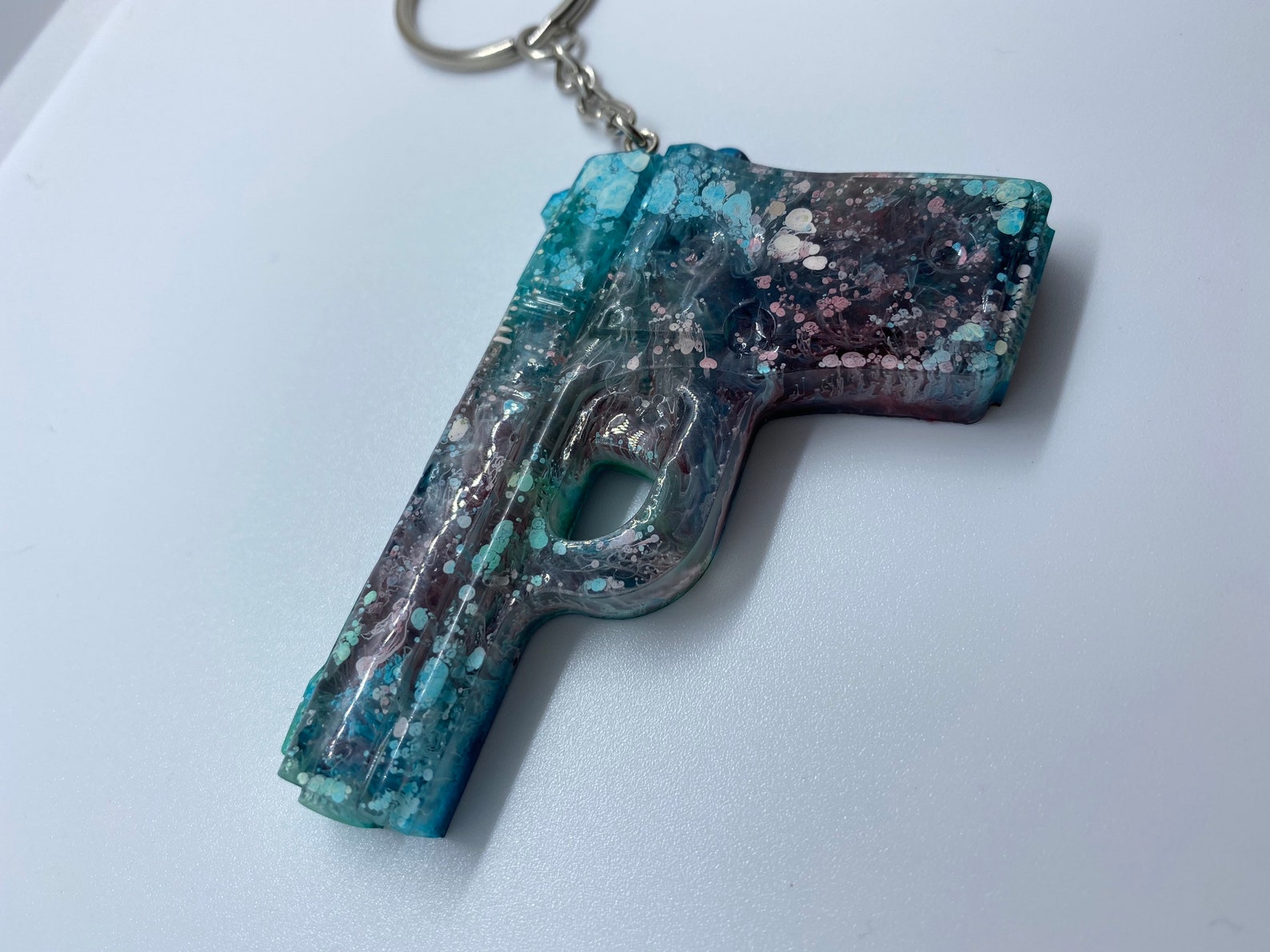 Handmade resin miniature gun keychain with ink drops Etsy