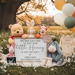 May include: A pregnancy announcement featuring Winnie the Pooh characters, balloons, and a onesie. A sign reads "We are excited to say our little Hunny is on the way! Arriving November 2026." An ultrasound image and baby booties are also included.