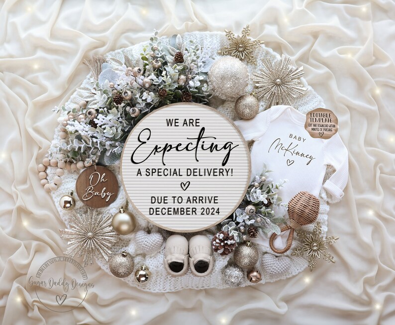 May include: A white knitted blanket with a wooden sign that reads "We are Expecting a Special Delivery! Due to Arrive December 2024". There are gold ornaments, a baby onesie that reads "Baby McKinney", and a wooden sign that reads "Oh Baby" on the blanket.