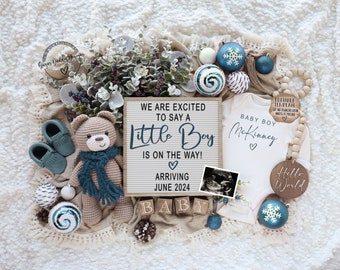 May include: A baby announcement with a blue and white color scheme. The announcement includes a sign that says "We are excited to say a little boy is on the way! Arriving June 2024." There are also a teddy bear, baby booties, a onesie, and a wooden sign that says "Hello World".