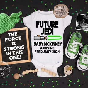 May include: A white onesie with the text "Future Jedi" and a green lightsaber graphic. The onesie also has the text "Baby McKinney Arriving February 2024". A green Yoda hat, a black letter board with the text "The Force is Strong in This One!" and a pair of green baby shoes are also in the image.