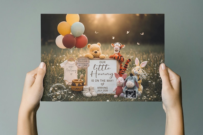 May include: A pregnancy announcement featuring Winnie the Pooh characters. The image includes a sign that reads "Our little Hunny is on the way!" with an expected arrival date of July 2026. Balloons and stuffed animals are also present.