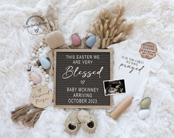May include: A pregnancy announcement featuring a letter board with the message "This Easter we are very blessed. Baby McKinney arriving October 2023". There is a small ultrasound image, a white onesie with the text "For this child we have prayed", and a wooden sign that says "Answered Prayer".