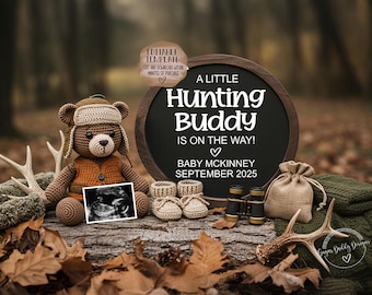 May include: A brown crocheted teddy bear wearing a hunter's hat and vest, holding an ultrasound image. A chalkboard sign reads "A Little Hunting Buddy is on the Way! Baby McKinney September 2025".