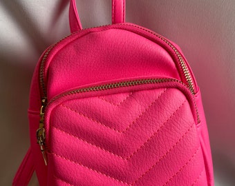 hot pink backpack purse