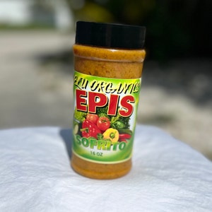 May include: A 16 ounce jar of Epi's All Organic Sofrito. The jar is labeled with a green, red, and yellow design featuring a variety of vegetables.