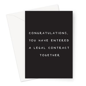 May include: A black card with white text that reads "Congratulations, you have entered a legal contract together".