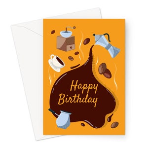 May include: A yellow card with a brown coffee stain and the text "Happy Birthday". The stain is surrounded by coffee beans, a coffee pot, a coffee grinder, and a cup of coffee.