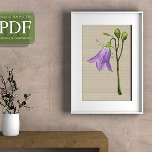 May include: Cross stitch pattern PDF instant download of a purple bellflower with green stems and buds.