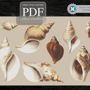 Peut inclure: Patron de point de croix en PDF à télécharger pour un ensemble de neuf coquillages de différentes couleurs et formes. Le motif est intitulé "Pattern Keeper Tested".
