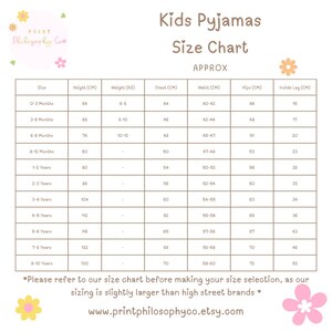 May include: A white informational size chart for kids pyjamas with brown text and floral accents. The table lists sizes from 0-3 months to 8-10 years, including columns for height in cm, weight in kg, chest, waist, hips, and inside leg in cm.