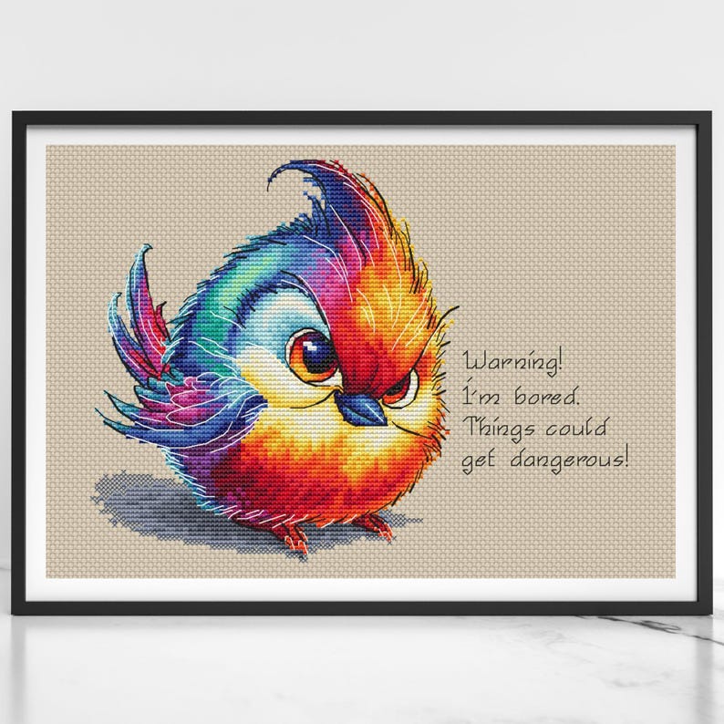 May include: A colorful, cartoon-style bird with a grumpy expression. The bird is red, orange, yellow, blue, and purple. The text reads "Warning! I'm bored. Things could get dangerous!"