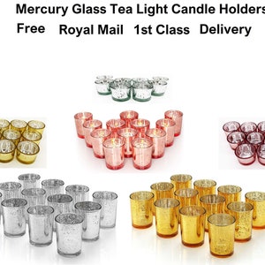 May include: Set of 12 mercury glass tea light candle holders in five different colours: gold, silver, green, pink, and red. The candle holders are arranged in groups of 12, with each group showing a different colour.