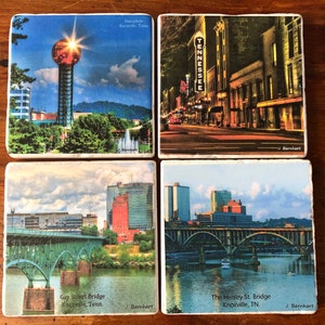 Coasters celebrating  Knoxville's history with  recent photos.   Sunsphere, Tennessee Theater, Gay St. Bridge and Henley St. Bridge