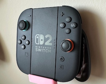 Soporte de pared para mando Switch Pro (SWITCH) / Joycon+Grips (SWITCH Y SWITCH2)