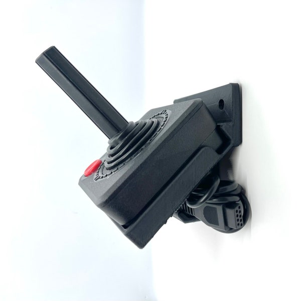 Soporte de pared/pantalla para joystick Atari