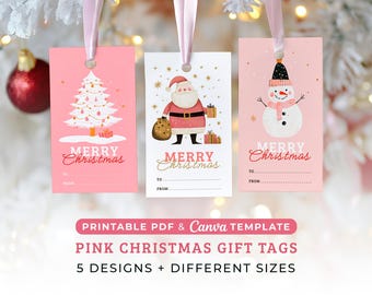 May include: Pink Christmas gift tags with festive designs. One tag features a Christmas tree, another Santa Claus, and the third a snowman. Each tag has "Merry Christmas" and "To/From" text. The tags are hanging with pink ribbons.