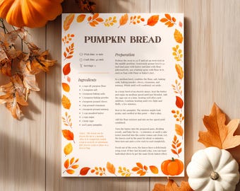 May include: A recipe for pumpkin bread on cream paper, decorated with orange and yellow leaf illustrations. The title "PUMPKIN BREAD" is in a serif font. Ingredients and preparation steps are listed. Pumpkins and leaves surround the paper.