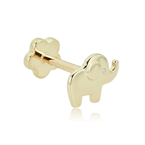 May include: Gold elephant stud earring with a small diamond accent. The earring has a flower-shaped post.