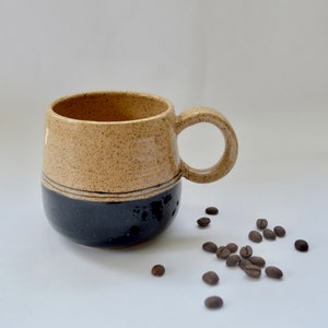 Black speckled mug