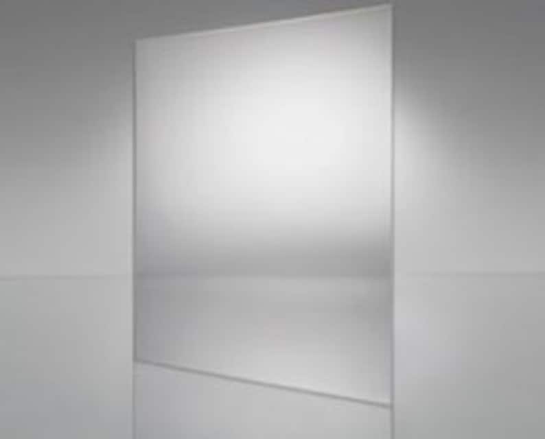 May include: A clear, smooth, rectangular sheet of acrylic plastic.