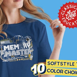 May include: A navy blue t-shirt with a graphic design featuring the words "Memory Master" and various illustrations, including a globe, a rocket ship, and a moon. The text "Classical Tee Education" is displayed in a red starburst shape.