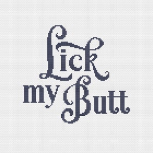 May include: A cross-stitch design on a white background. The text "Lick my Butt" is displayed in a dark blue, stylized font. The letters are formed with small, square stitches, creating a textured appearance.