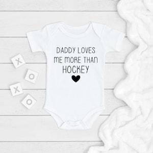 Daddy Loves Me More Than Hockey ONESIE®, Pregnancy Announcement Baby Bodysuit, Newborn Baby Gift