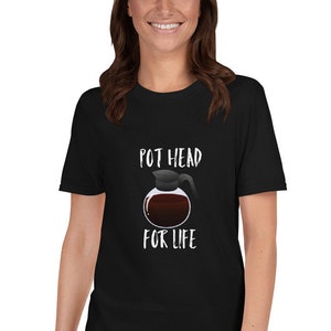May include: Black t-shirt with a white graphic of a coffee pot and the text "Pot Head For Life".
