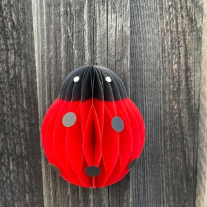 Coccinella di carta da appendere all'albero di Natale
