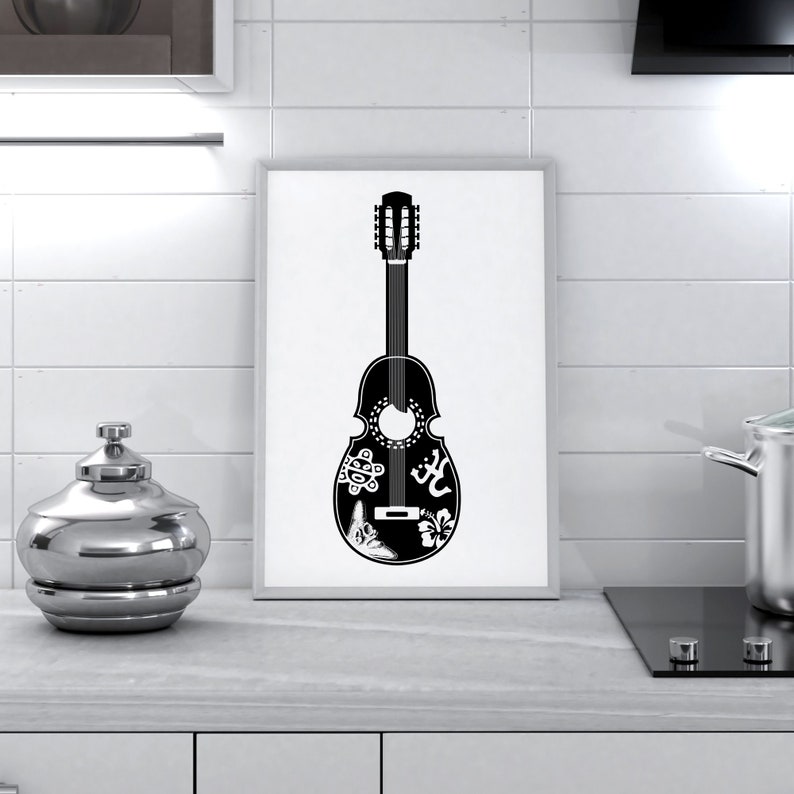 May include: A black and white illustration of a guitar with intricate designs, including a flower, a bird, and a symbol. The guitar is framed and hanging on a white tiled wall.