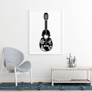 May include: Black and white illustration of a cuatro, a traditional Puerto Rican instrument, with decorative designs on the body. The cuatro is displayed in a white frame against a white wall.