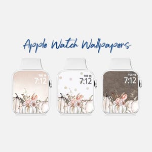 May include: Three Apple Watch faces with a fall-themed design featuring white pumpkins, pink and brown flowers, and a brown, beige, or white background. The time is displayed as 7:12 with the day of the week and date.
